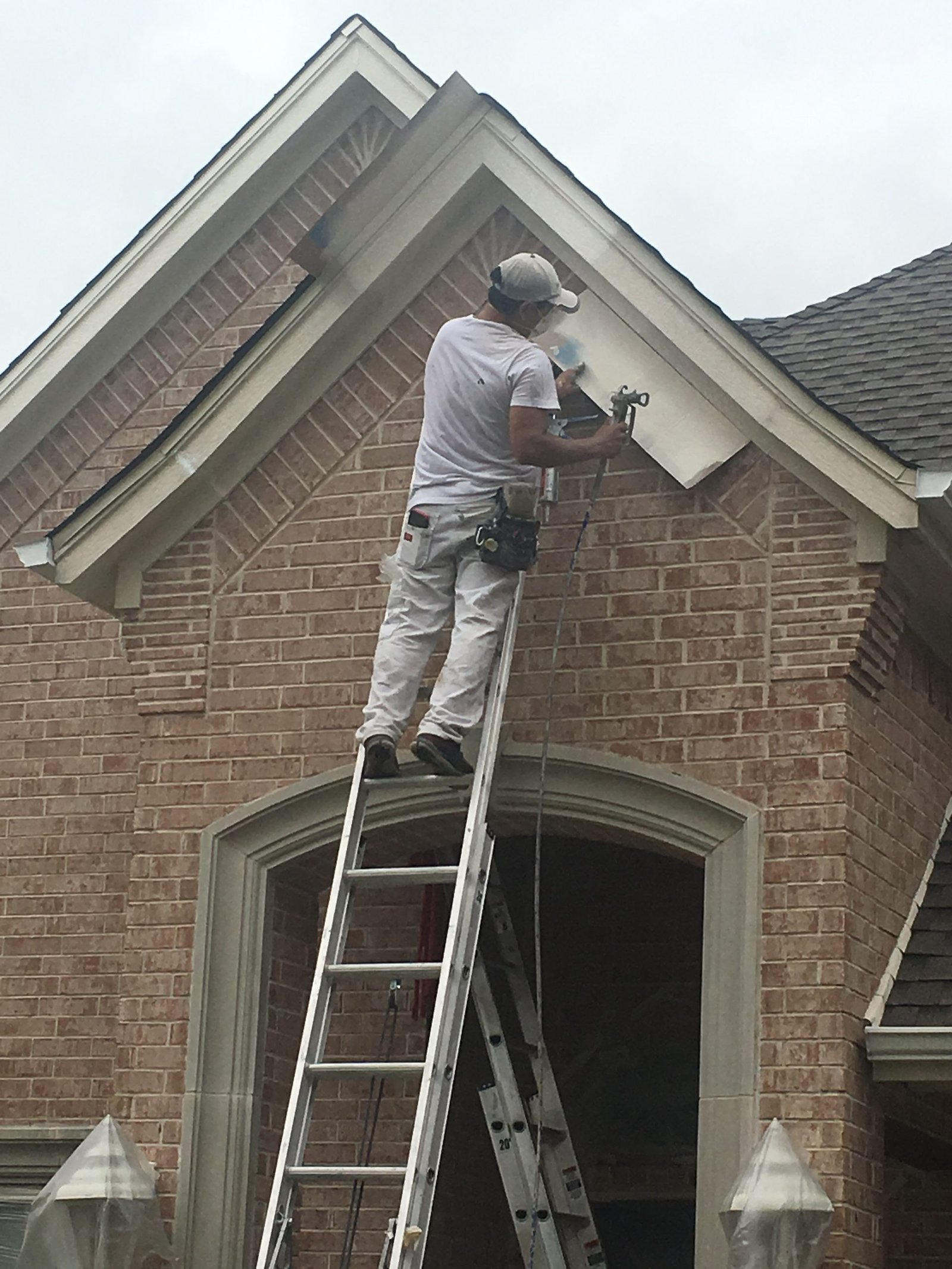 exterior painting. careful application of paint